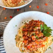 Veggie Pasta Sauce (with Beef) in two round white bowls