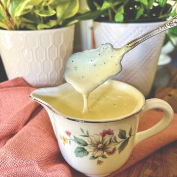 orange poppyseed dressing in hall china pitcher