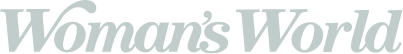 Light gray text reads Womans World in a large, elegant font with a curly flourish on the letter W, set against a white background.