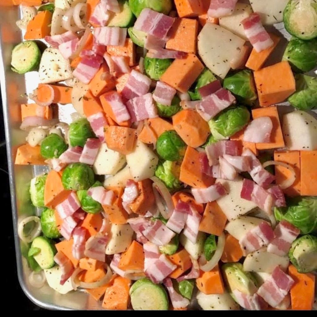 chicken vegetable sheet pan with roasted carrots, parsnips, brussels, onions, bacon and garlic