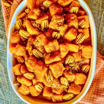 Maple Sweet Potatoes in white casserole dish