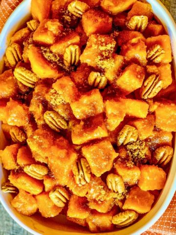 Maple Sweet Potatoes in white casserole dish