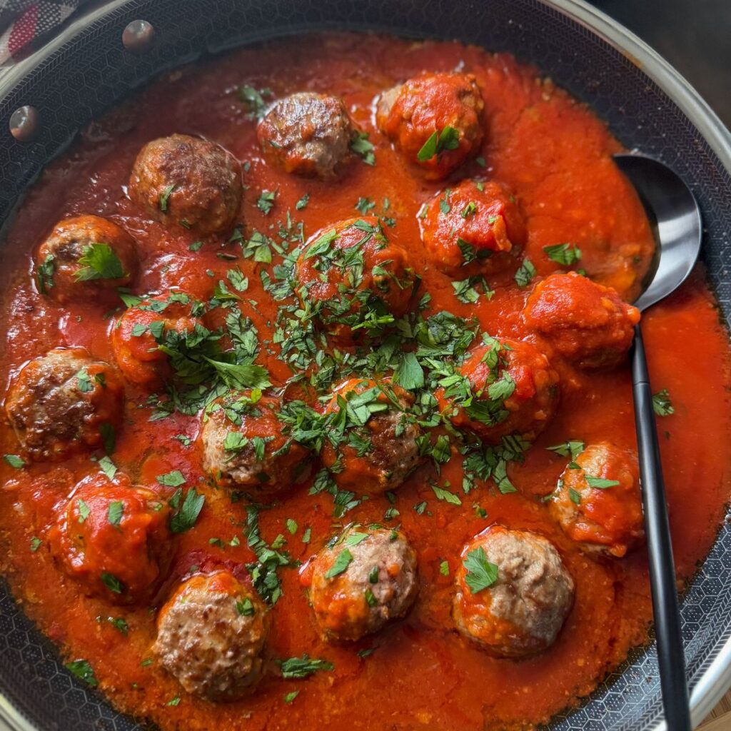 skillet meatballs in pan with sauce