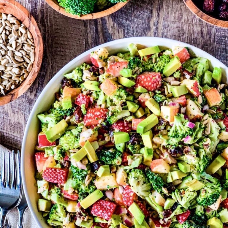 Strawberry Apple Avocado Broccoli Salad with Creamy Poppyseed Dressing in large round white bowl