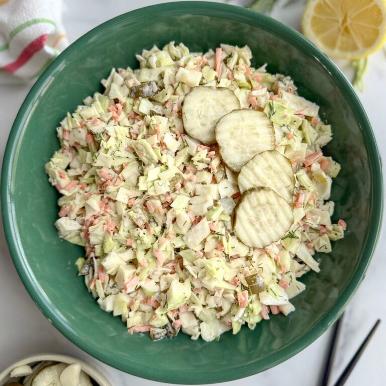 chopped dill pickle slaw in round green bowl