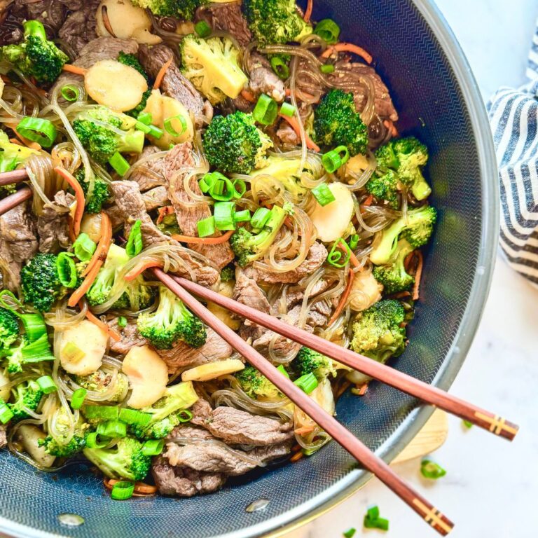 Easy beef lo mein in large hex clad with chop sticks