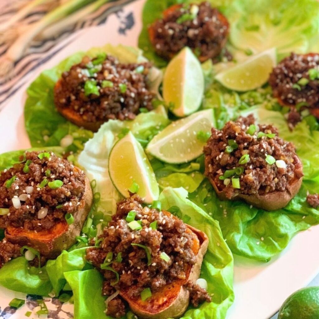 korean beef over sweet potato rounds on lettuce